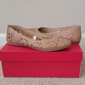 Tan floral flats